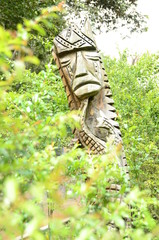  wood carving, surrounded by Colombian nature