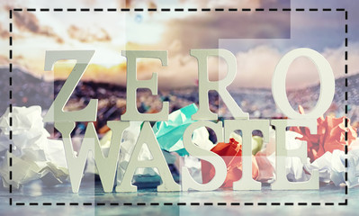 The concept of proper and environmental health. The inscription on black background with wooden letters and paper elements. Free GMO. Zero waste.