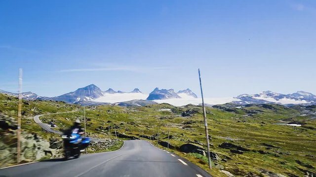 Driving scenic route Sognefjellet linking he coast and inland areas from Lom, Boverdalen to Gaupne in Western Norway