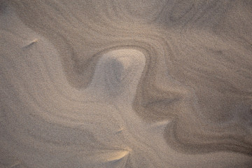 Fototapeta na wymiar Sand waves on sand dunes in the Slowinski National Park. Czolpino, Leba, Poland