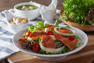 Fresh vegetable salad with smoked salmon