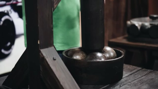 Da Vinci's wooden bearing at work in the Museum. Close up. Science and technology.