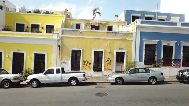 Pull Back Aerial View of Colorful Houses and Street in La Perla Neighborhood, San Juan, Puerto Rico