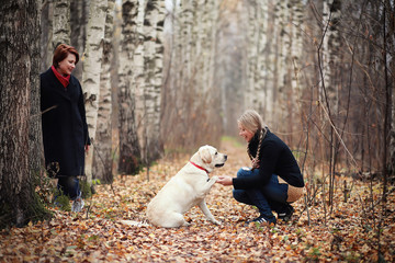 Young girl on a walk in the autumn