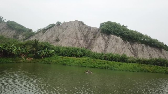 Aerial View On Lake Under Mudstone Hills in Tianliao Moon World Landscape Park, Taiwan