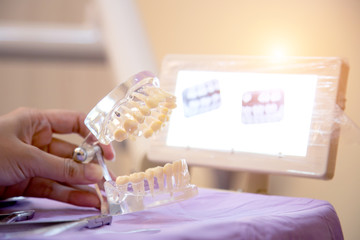 Teeth model and dental tools in dental clinics