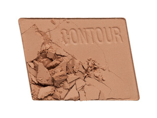 Sample of dry contour face powder isolated on white