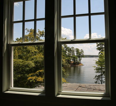 Window with view of a lake in the distance