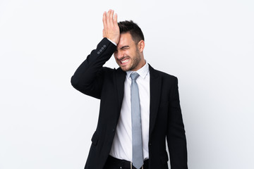 Young business man over isolated background having doubts with confuse face expression