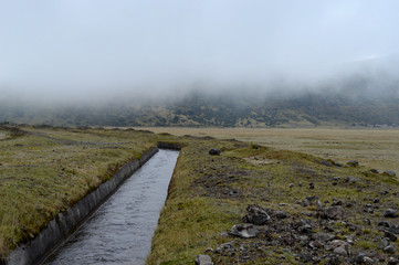 Fototapeta na wymiar Cotopaxi national park area, stream, fog