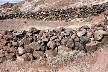 Stone fence in a desertic place (Madeira, Portugal, Europe)