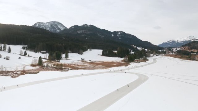 AS people icescating on lake Weissensee in Carinthia, Austria