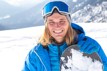 Fototapeta na wymiar Professional snowboarder in Alps. Italy Val di fassa