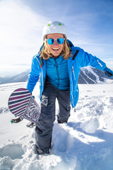 Professional snowboarder in Alps. Italy Val di fassa