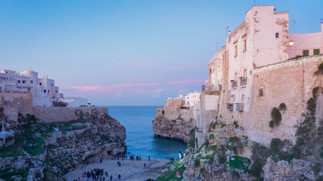 Cliff top houses at dusk Italy