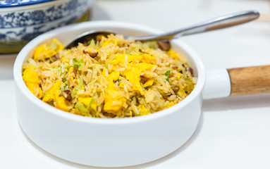 Egg fried rice in white ceramic bowl