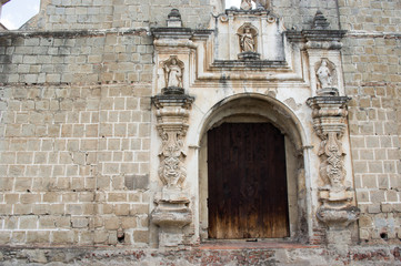 Fototapeta na wymiar Entrance of a ancient building in Antigua, Guatemala