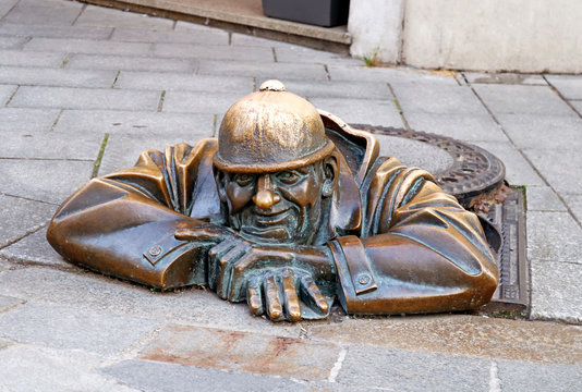 BRATISLAVA, SLOVAKIA - AUGUST 30 , 2019: Famous sculpture of Man at Work in the city center