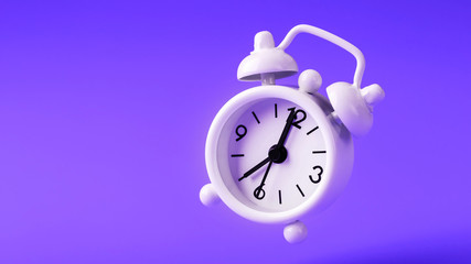 White retro style alarm clock in levitation isolated on purple background.