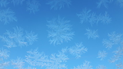 Fototapeta na wymiar blue winter background with snowflakes
