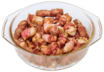 Grilled Mixed Meat Loaves and Chicken Breast Bacon Rolls Served with Chopped Onion in Glass Baking Dish Isolated on White Background