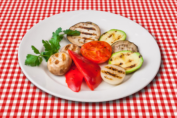 Grilled Vegetables and button mushrooms on white plate