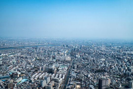 Asia business concept for real estate and corporate construction - panoramic urban city skyline aerial view under sky in tokyo, Japan © yaophotograph