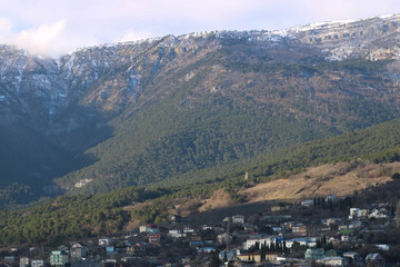 Obraz premium green mountains with snow blue sky