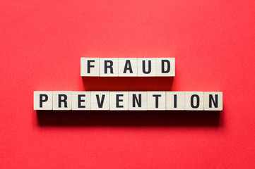 Fraud Prevention word concept on cubes