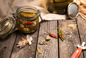 pickled cucumbers, cucumbers in a glass jar, canned cucumbers