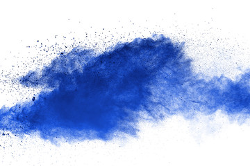 Abstract brown powder explosion. Closeup of blue dust particle splash isolated on white  background