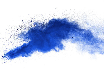 Abstract brown powder explosion. Closeup of blue dust particle splash isolated on white  background