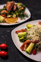 salad with meat, vegetable mix, salad with seafood, seaweed, Chuka with nut sauce, fish, shrimp, avocado, several types of salad, cold appetizers