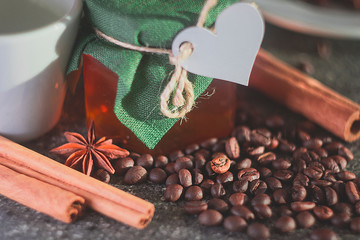 Glass jar with honey for Valentine's Day.