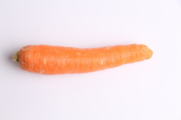 delicious carrot in color background