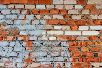 Brickwork of gray and red bricks.