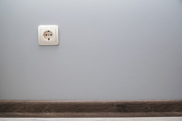Electrical outlet on the wall. The apartment is after repair.
