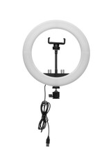 Closeup of circular neon LED lamp isolated white background. Popular modern light for make-up and beauty portraits.