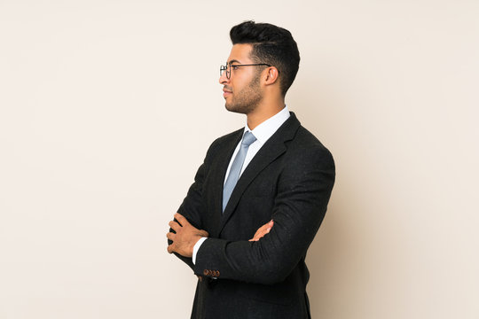 Young handsome businessman man over isolated background