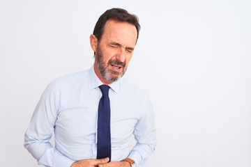 Middle age businessman wearing elegant tie standing over isolated white background with hand on stomach because indigestion, painful illness feeling unwell. Ache concept.