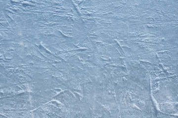 Ice skating rink, cutting ice, snow. Winter sport. Close-up photo.