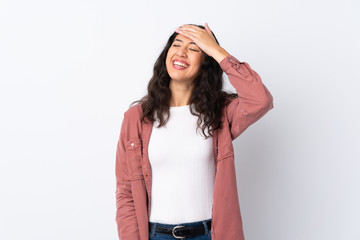 Spanish Chinese woman over isolated white background laughing