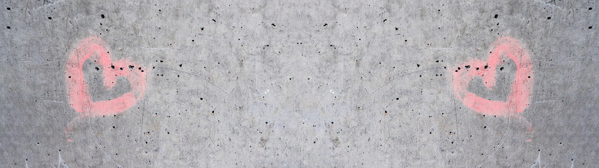 Pink heart on rustic grey concrete stone texture wall background panorama banner long