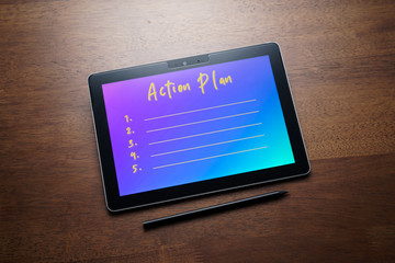 Business concept - Action Plan list write on PC tablet