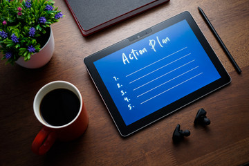 Business concept - Action Plan list write on PC tablet