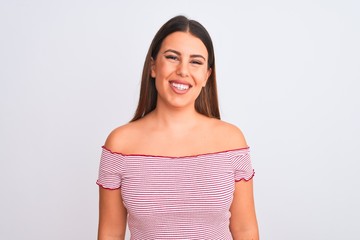 Portrait of beautiful young woman standing over isolated white background with a happy and cool smile on face. Lucky person.