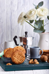 Delicious homemade crispy cookies with walnuts. Served with cup of coffee. 