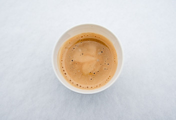 cup of coffee in the snow