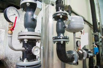 Manometer, pipes and faucet valves of heating system