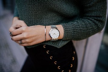 Stylish silver watch on woman hand